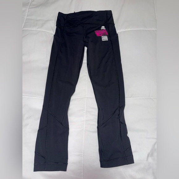 lululemon athletica Pants - lululemon athletica Black Leggings with Pink Logo Patch